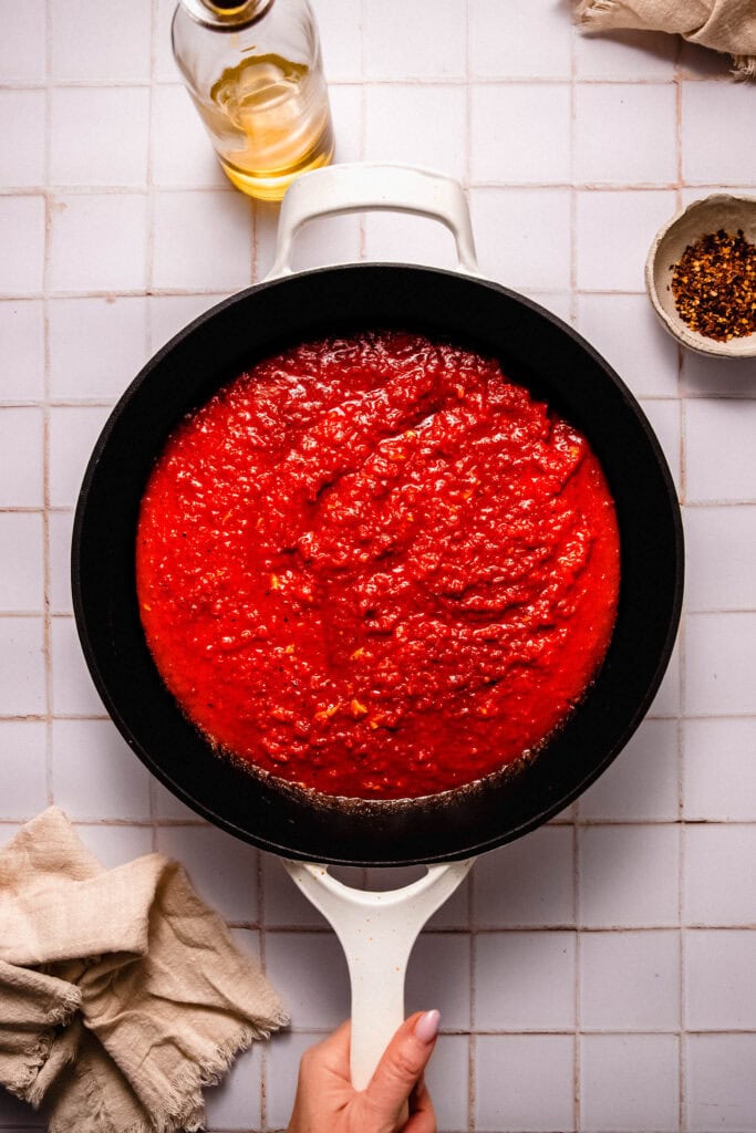 Tomatoes added to skillet.
